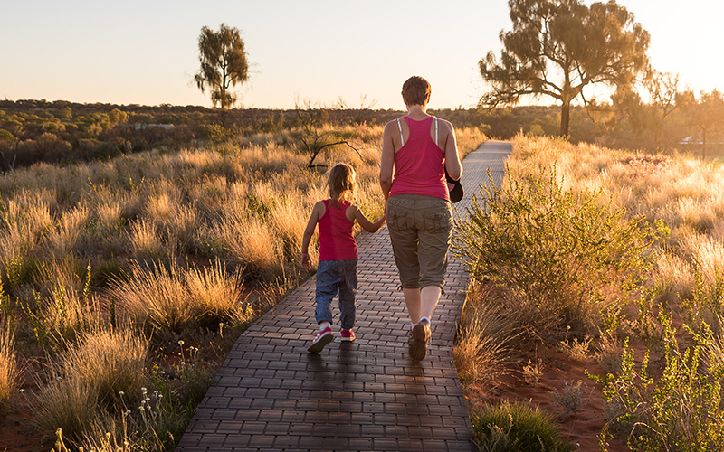 mom walking with her daughter